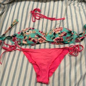 Eidon bathing suit bandeau top size xs and large bottom. Comes with straps